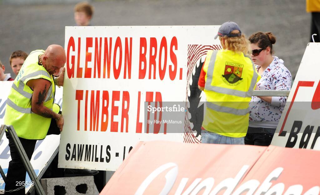11 May 2008; Local ground-staff fix back a sign that had fallen down. GAA Football Leinster Senior Championship, Longford v Westmeath, Pearse Park, Longford. Picture credit: Ray McManus / SPORTSFILE