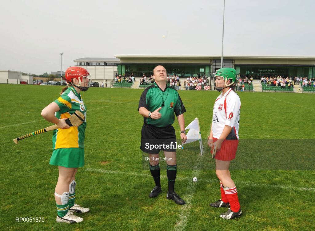 11 May 2008; Referee Mike O'Kelly, tosses the coin with captains Claire Nevin, Offaly, left, and Gráinne McNicholl, Derry. All-Ireland Under 16B Championship Final, Derry v Offaly, Donaghmore, Ashbourne, Co. Meath. Picture Credit: Ray Lohan / SPORTSFILE  *** Local Caption ***