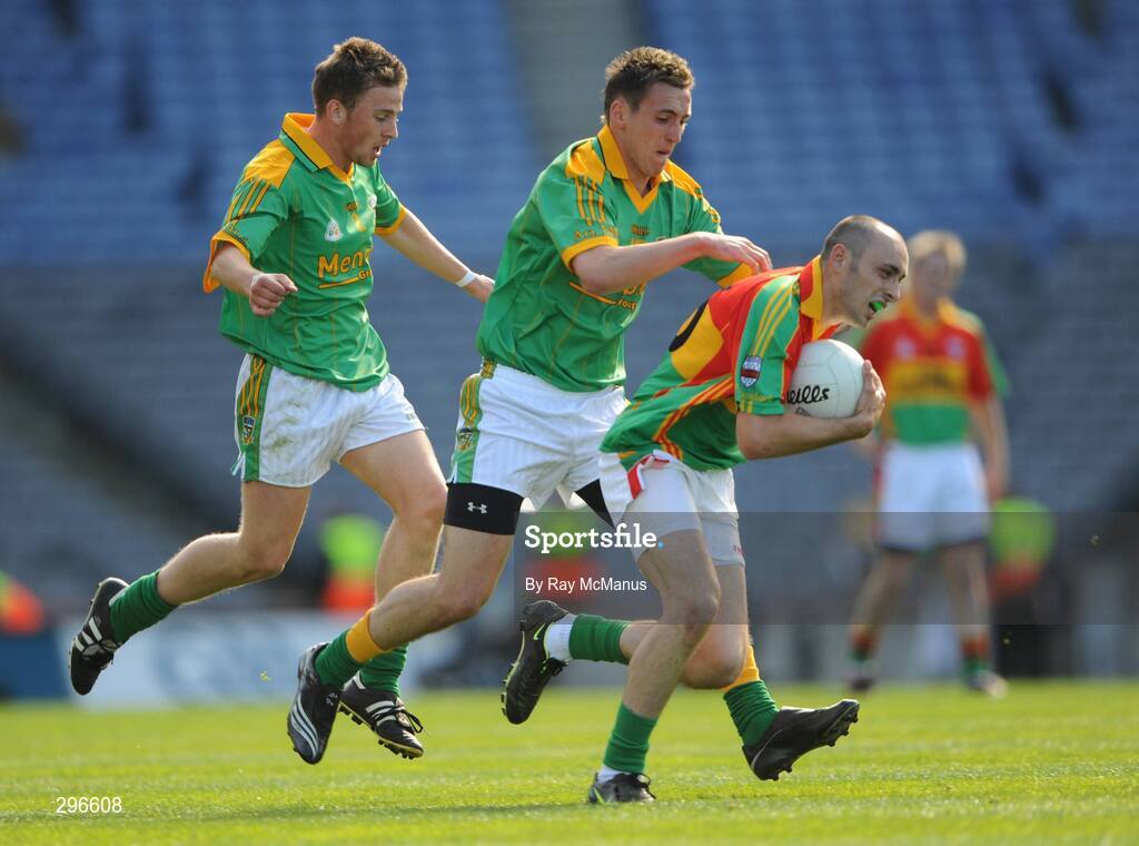 18 May 2008; J.J. Smith, Carlow, is tackled by Meath defenders Chris O'Connor, left, and Graham Reilly. GAA Football Leinster Senior Championship 1st Round, Meath v Carlow, Croke Park, Dublin. Picture credit: Ray McManus / SPORTSFILE