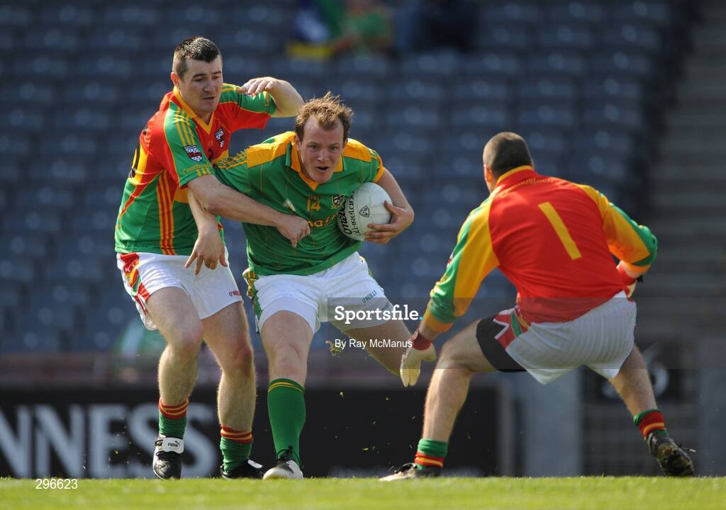 18 May 2008; Joe Sheridan, Meath, is tackled by Joe Roche, left, and John Brennan, Carlow. GAA Football Leinster Senior Championship 1st Round, Meath v Carlow, Croke Park, Dublin. Picture credit: Ray McManus / SPORTSFILE