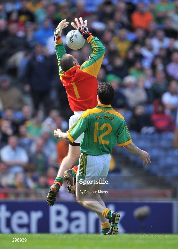 18 May 2008; Carlow goalkeeper John Brennan catches a high ball ahead of Peadar Byrne. GAA Football Leinster Senior Championship 1st Round, Meath v Carlow, Croke Park, Dublin. Picture credit: Brendan Moran / SPORTSFILE