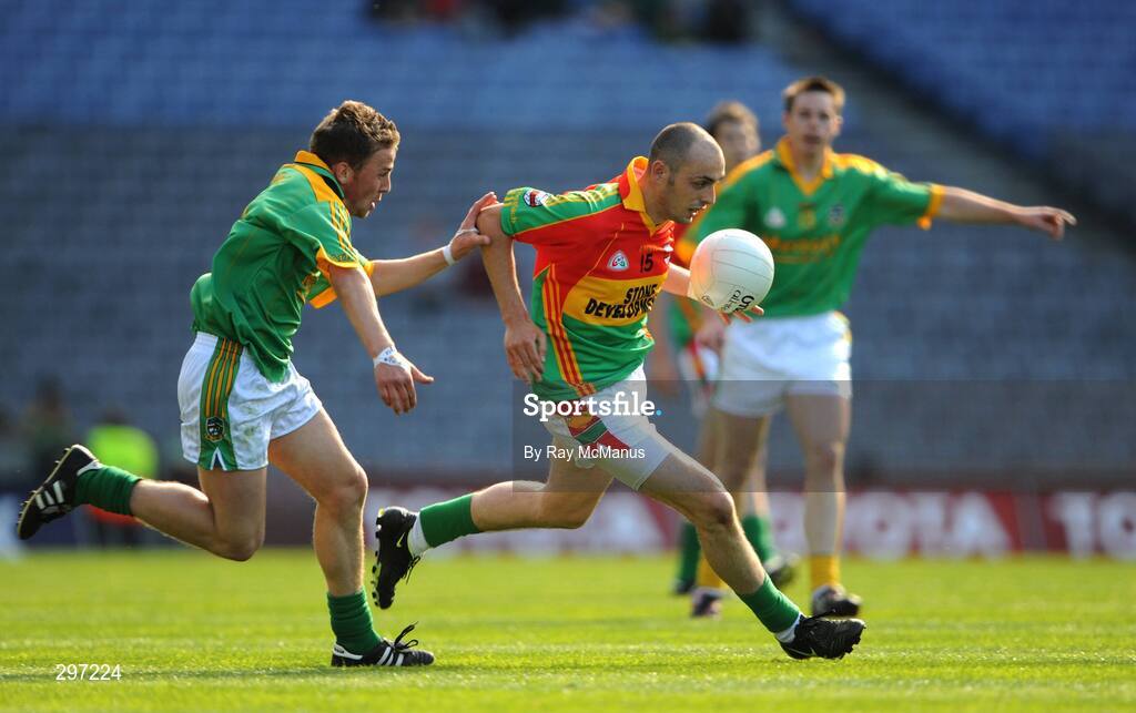 18 May 2008; J.J. Smith, Carlow, is tackled by Meath defender Chris O'Connor. GAA Football Leinster Senior Championship 1st Round, Meath v Carlow, Croke Park, Dublin. Picture credit: Ray McManus / SPORTSFILE
