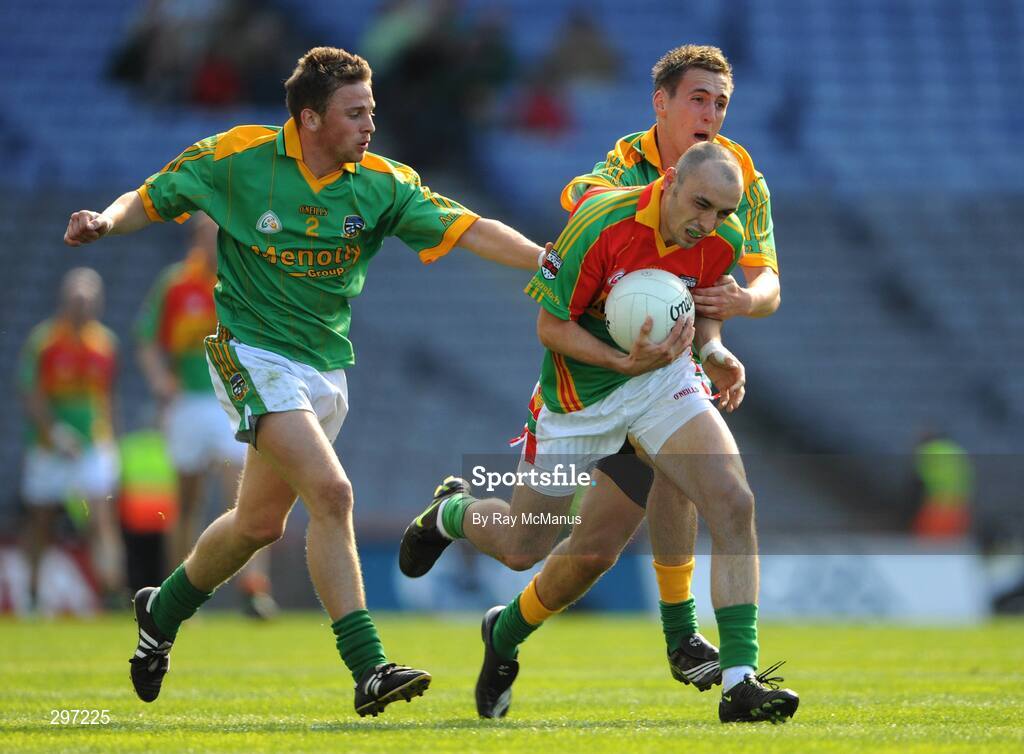 18 May 2008; J.J. Smith, Carlow, is tackled by Meath defenders Chris O'Connor, left, and Graham Reilly. GAA Football Leinster Senior Championship 1st Round, Meath v Carlow, Croke Park, Dublin. Picture credit: Ray McManus / SPORTSFILE