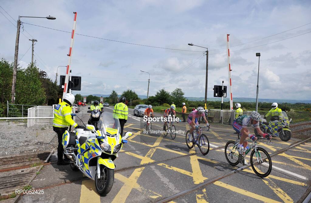 22 May 2008; Irish National champion and Pezula rider, David O'Loughlin leads the break-away group over a level crossing in Farranfore, Co. Kerry. FBD Insurance Ras 2008 - Stage 5, Tralee - Skibbereen. Picture credit: Stephen McCarthy / SPORTSFILE