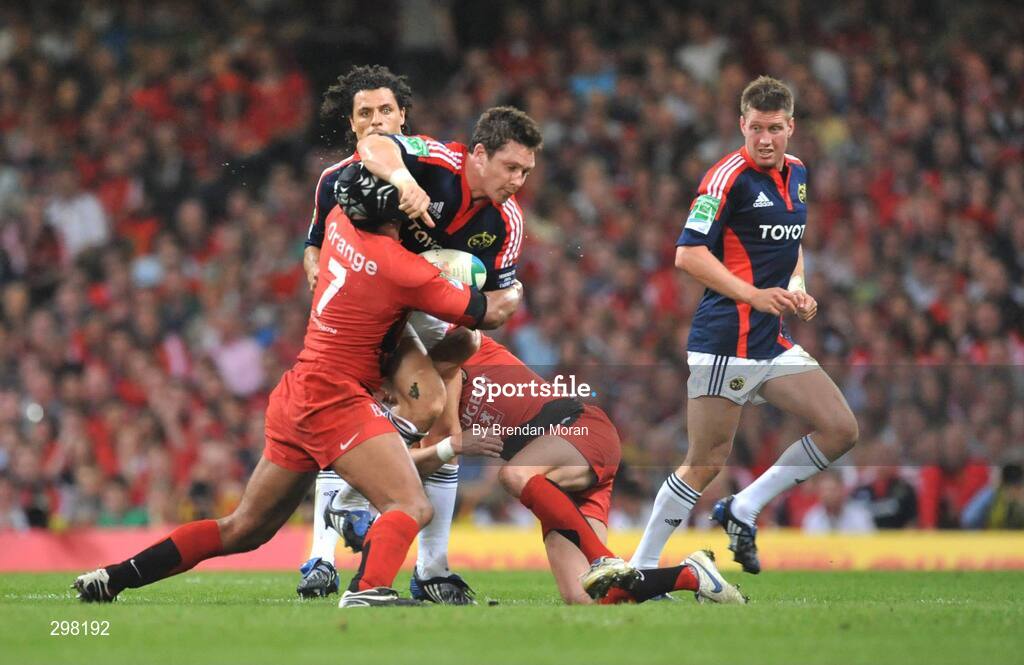 24 May 2008; David Wallace, Munster, is tackled by theirry Dusautoir, left, and Jean Baptiste Ellisalde, Toulouse. Heineken Cup Final, Munster v Toulouse, Millennium Stadium, Cardiff, Wales. Picture credit: Brendan Moran / SPORTSFILE