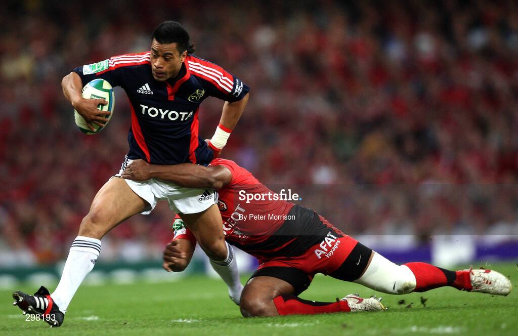 24 May 2008; Lifeimi Mafi, Munster, is tackled by Yves Donguy, Toulouse. Heineken Cup Final, Munster v Toulouse, Millennium Stadium, Cardiff, Wales. Picture credit: Peter Morrison / SPORTSFILE
