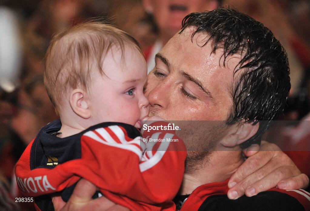 24 May 2008; Munster's Marcus Horan kisses his daughter Heather after victory over Toulouse. Heineken Cup Final, Munster v Toulouse, Millennium Stadium, Cardiff, Wales. Picture credit: Brendan Moran / SPORTSFILE