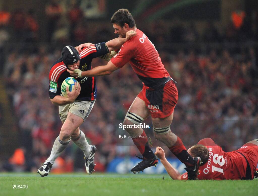 24 May 2008; Denis Leamy, Munster, is tackled by Fabien Pelous, Toulouse. Heineken Cup Final, Munster v Toulouse, Millennium Stadium, Cardiff, Wales. Picture credit: Brendan Moran / SPORTSFILE
