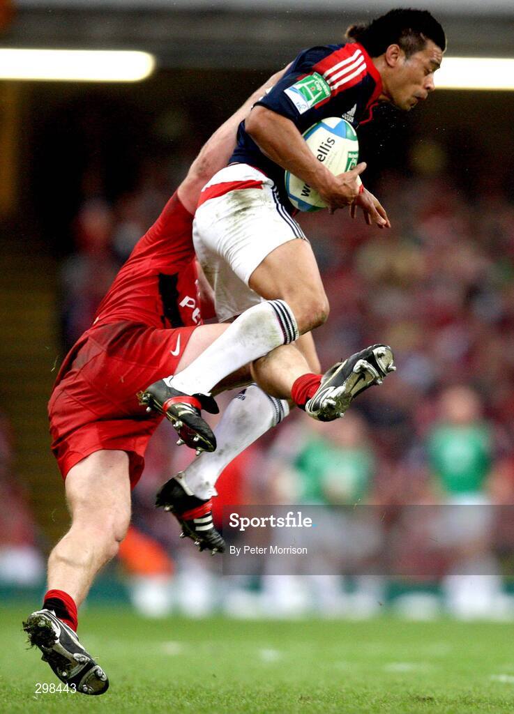 24 May 2008; Rua Tipoki, Munster, is tackled by William Servat, Toulouse. Heineken Cup Final, Munster v Toulouse, Millennium Stadium, Cardiff, Wales. Picture credit: Peter Morrison / SPORTSFILE