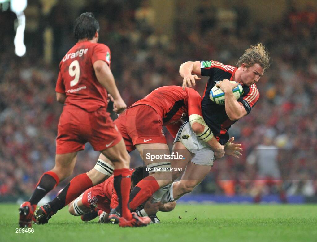 24 May 2008; Jerry Flannery, Munster, is tackled by Fabien Pelous, left, and Gregory Lamboley, Toulouse. Heineken Cup Final, Munster v Toulouse, Millennium Stadium, Cardiff, Wales. Picture credit: Brendan Moran / SPORTSFILE