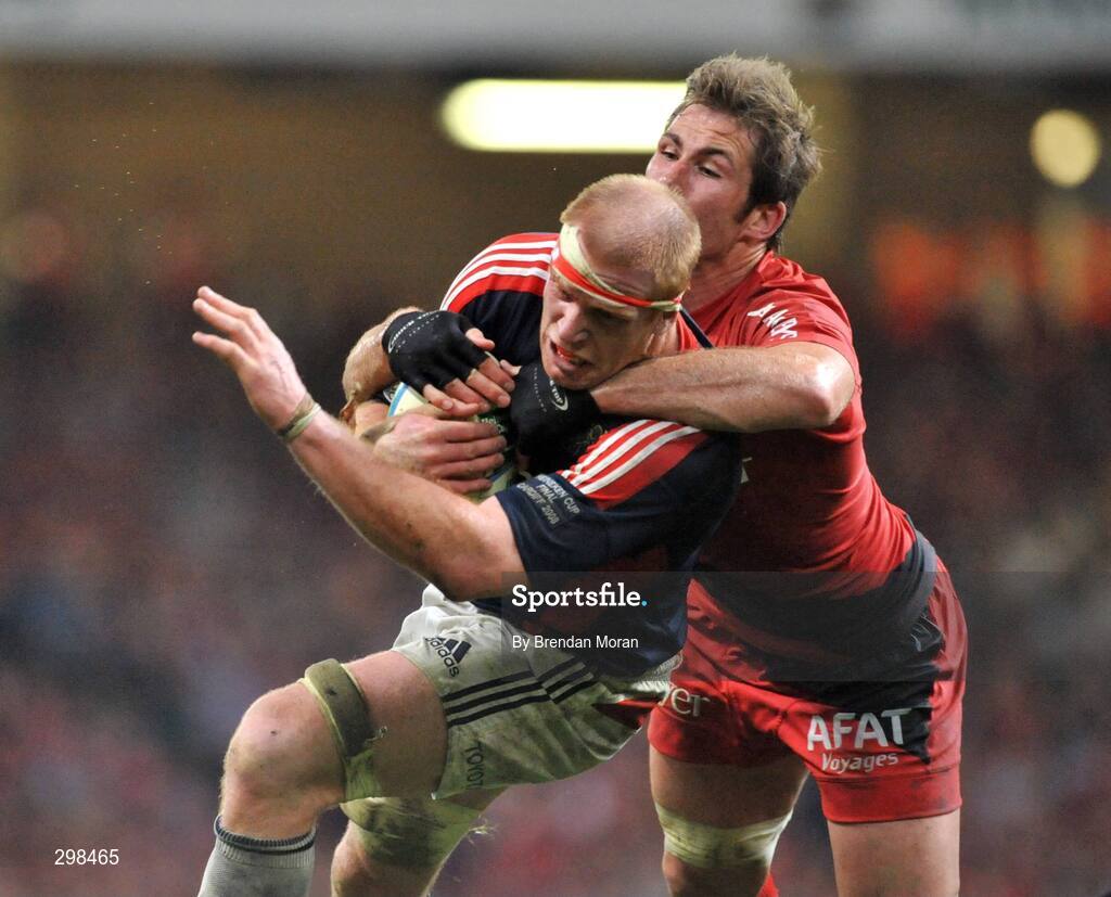24 May 2008; Paul O'Connell, Munster, is tackled by Shaun Sowerby, Toulouse. Heineken Cup Final, Munster v Toulouse, Millennium Stadium, Cardiff, Wales. Picture credit: Brendan Moran / SPORTSFILE