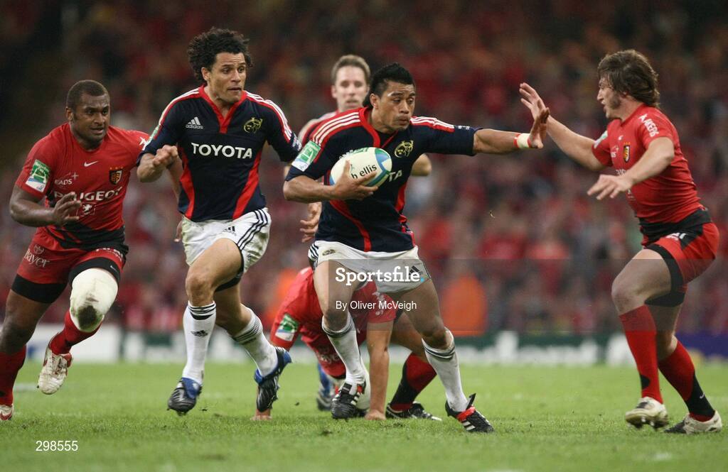 24 May 2008; Lifeimi Mafi, Munster, supported by team-mate Doug Howlett is tackled by Maxime Medard, Toulouse. Heineken Cup Final, Munster v Toulouse, Millennium Stadium, Cardiff, Wales. Picture credit: Oliver McVeigh / SPORTSFILE