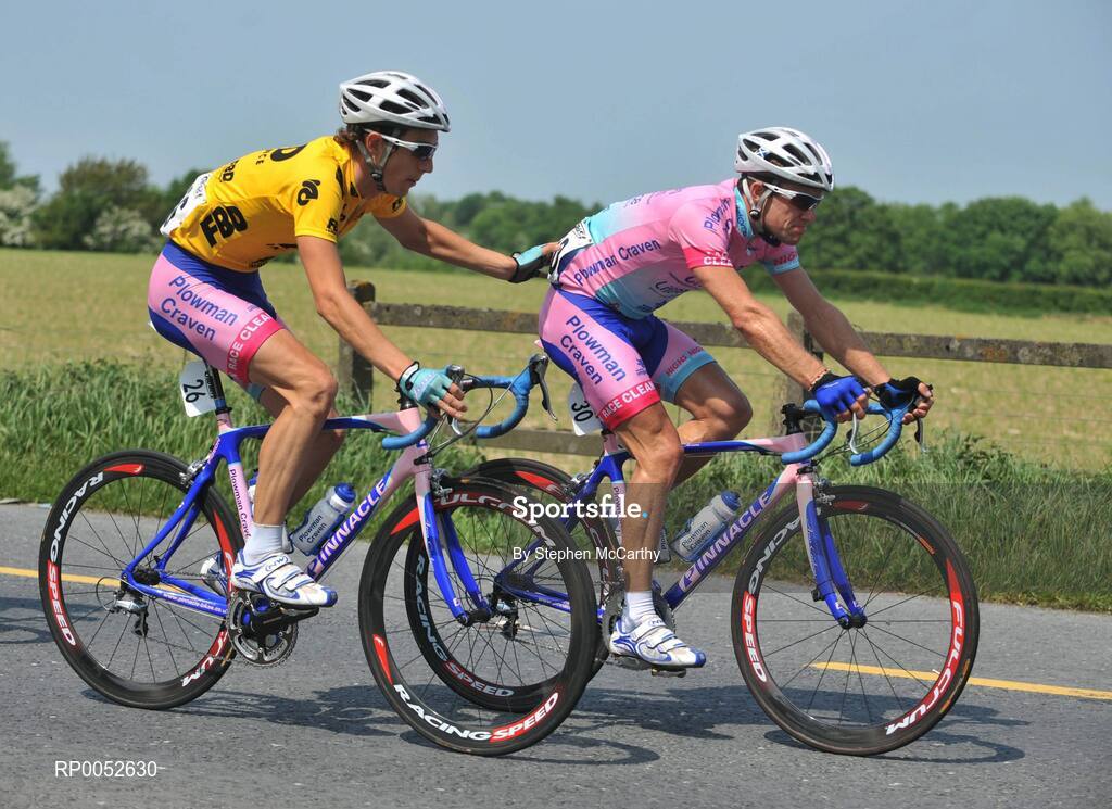 24 May 2008; Evan Oliphant, Plowman Craven, gets a helping hand from team-mate and yellow jersey wearer Simon Richardson during the race. FBD Insurance Ras 2008 - Stage 7, Clonmel - Roundwood. Picture credit: Stephen McCarthy / SPORTSFILE