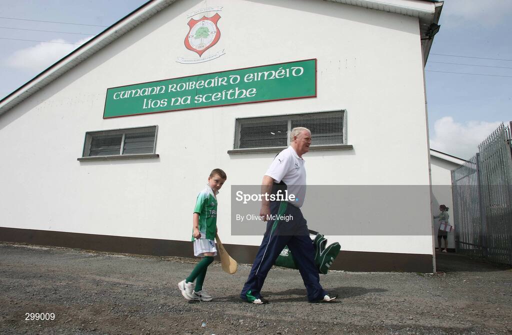 11 May 2008; Fermanagh manager Tommy Walsh arrives for the game with his seven year old grandson Darragh Galligan. Ulster Senior Hurling Championship, Fermanagh v Tyrone, Emmett Park, Lisnaskea, Co. Fermanagh. Picture credit: Oliver McVeigh / SPORTSFILE