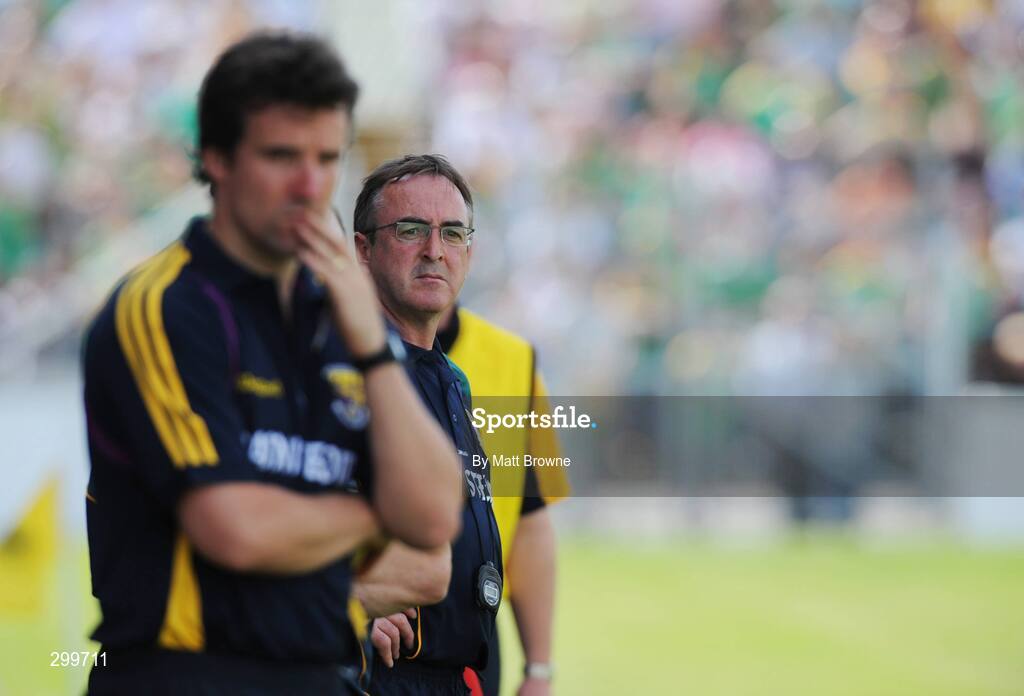 1 June 2008; Meath manager Colm Coyle watches the game with Wexford manager Jason Ryan. GAA Football Leinster Senior Championship Quarter-Final, Meath v Wexford, Dr. Cullen Park, Carlow. Picture credit: Matt Browne / SPORTSFILE