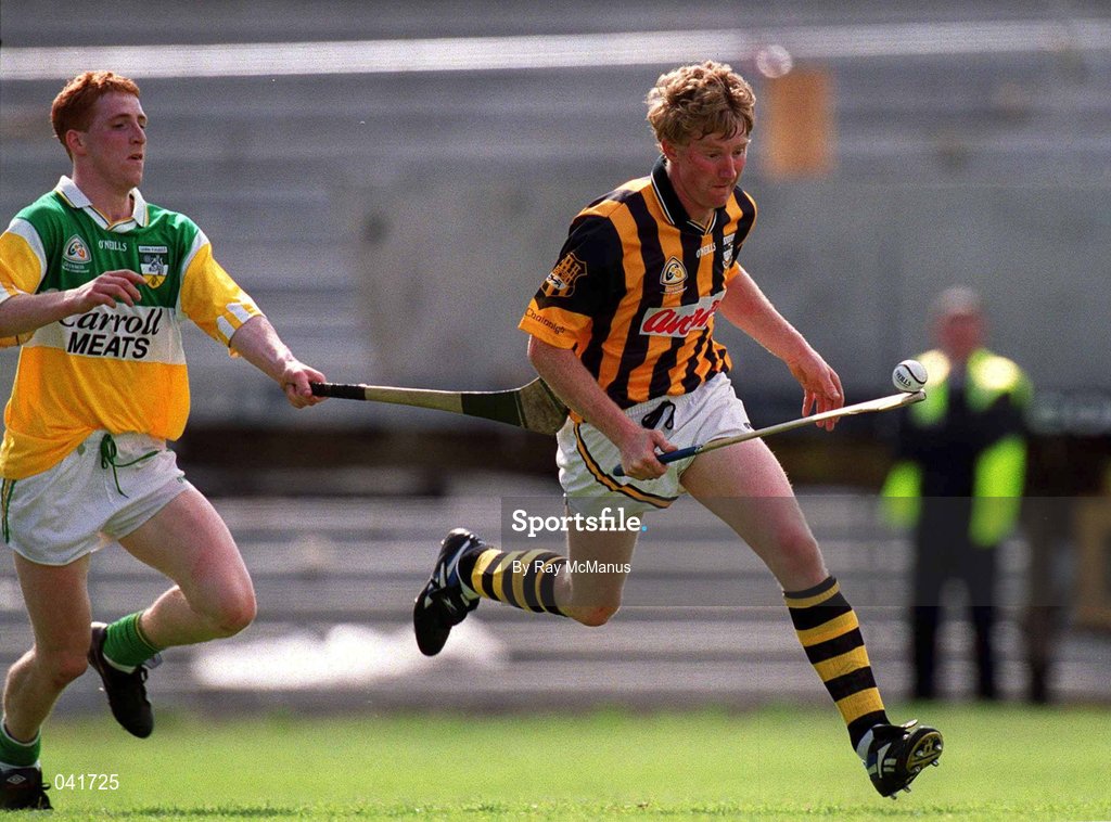 9 July 2000; John power of Kilkenny in action against Simon Whelahan of Offaly during the Guinness Leinster Senior Hurling Championship Final match between Kilkenny and Offaly at Croke Park in Dublin. Photo by Ray McManus/Sportsfile