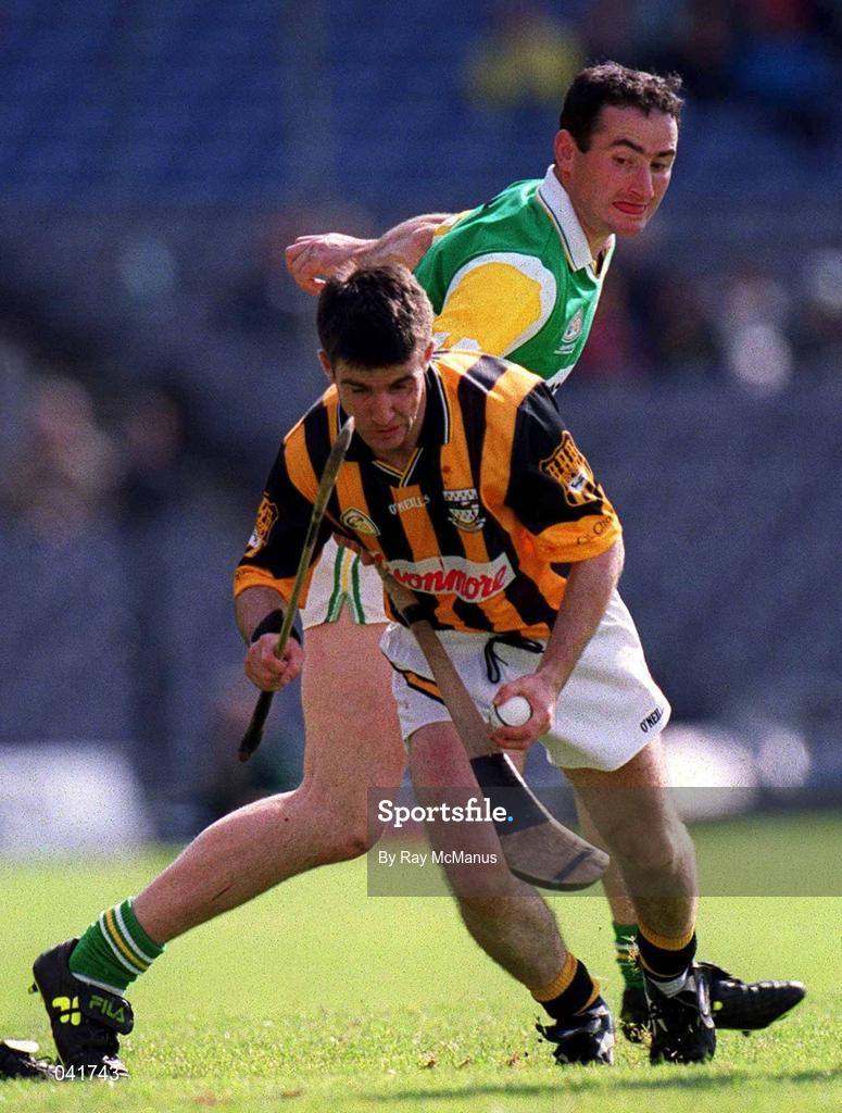 9 July 2000; Philip Larkin of Kilkenny in action against Kevin Kinahan of Offaly during the Guinness Leinster Senior Hurling Championship Final match between Kilkenny and Offaly at Croke Park in Dublin. Photo by Ray McManus/Sportsfile