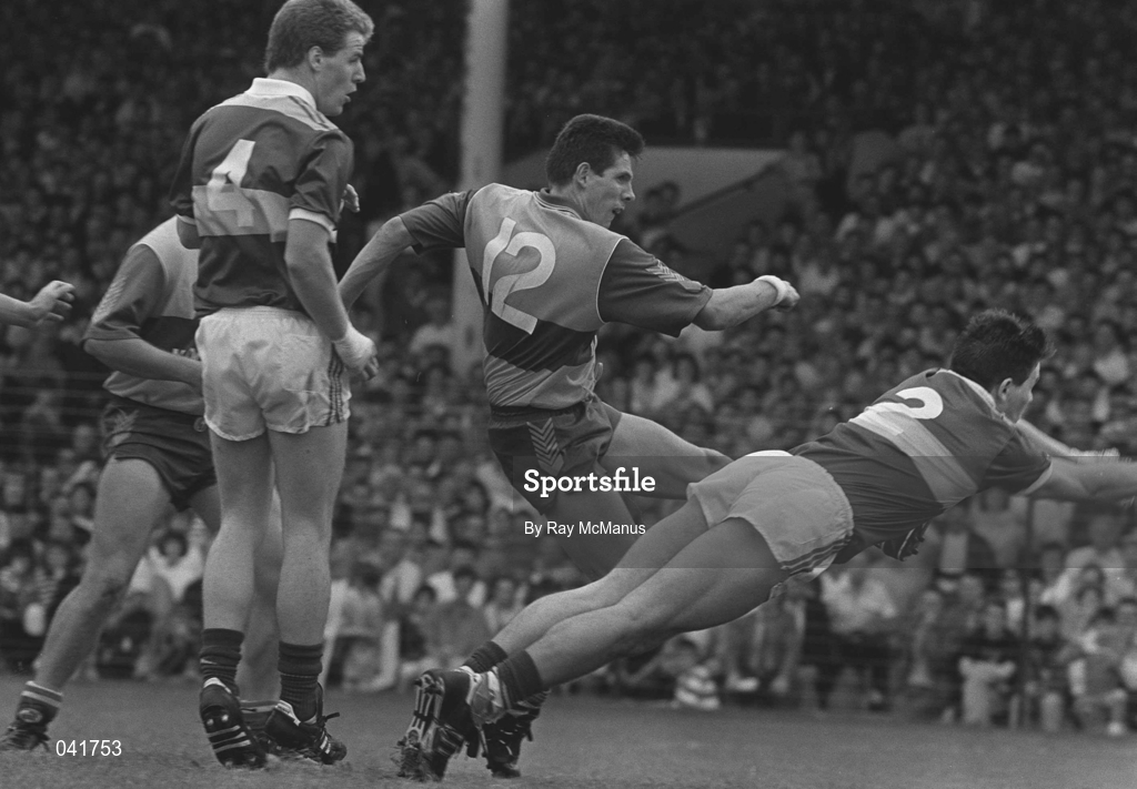 19 July 1992; Gerry Killeen of Clare shoots to score a goal despite the efforts of Stephen Stack of Kerry during the Munster Senior Football Championship Final match between Clare and Kerry at the Gaelic Grounds in Limerick. Photo by Ray McManus/Sportsfile