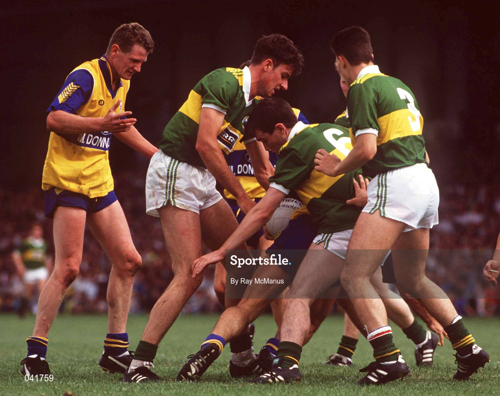 19 July 1992; Noel Roche, right,  and Tom Morrissey of Clare in action against Noel O'Mahony, left, Sean Burke, centre, and Anthony Glesson of Kerry during the Munster Senior Football Championship Final match between Clare and Kerry at the Gaelic Grounds in Limerick. Photo by Ray McManus/Sportsfile