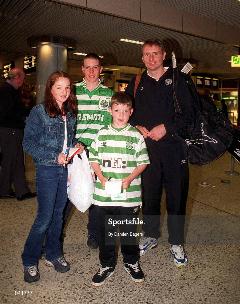 8 July 2000; Tommy Boyd of Celtic pictured with Celtic supporters at Dublin Airport ahead of the Pre-Season Friendly between Bray Wanderers and Celtic which will take place at The Carlisle Grounds in Bray, Wicklow. Photo by Damien Eagers/Sportsfile