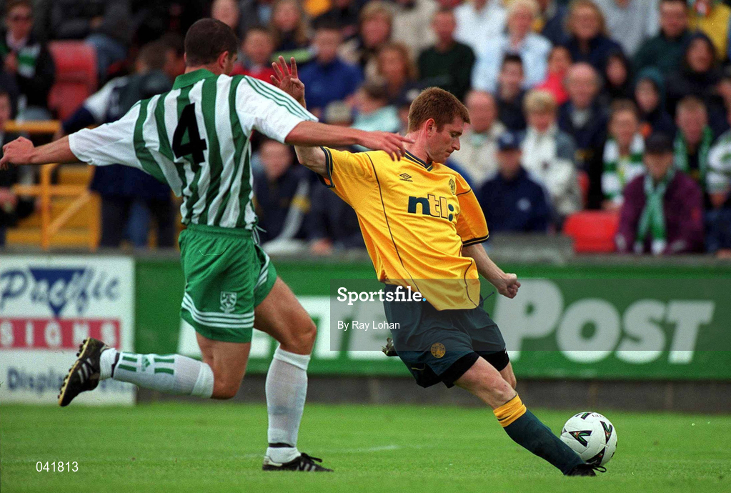 9 July 2000; Tommy Johnson of Celtic shoots to score his sides second goal despite the efforts of Jody Lunch of Bray Wanderers during the Pre-Season Friendly between Bray Wanderers and Celtic at the Carlisle Grounds in Bray, Wicklow. Photo by Ray Lohan/Sportsfile