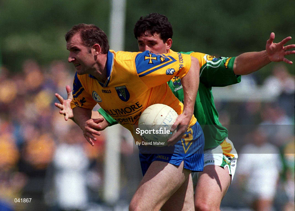 2 July 2000; Fergal O'Donnell of Roscommon in action against Seamus Quinn of Leitrim during the Bank of Ireland Connacht Senior Football Championship Semi-Final match between Roscommon and Leitrim at Dr Hyde Park in Roscommon. Photo by David Maher/Sportsfile