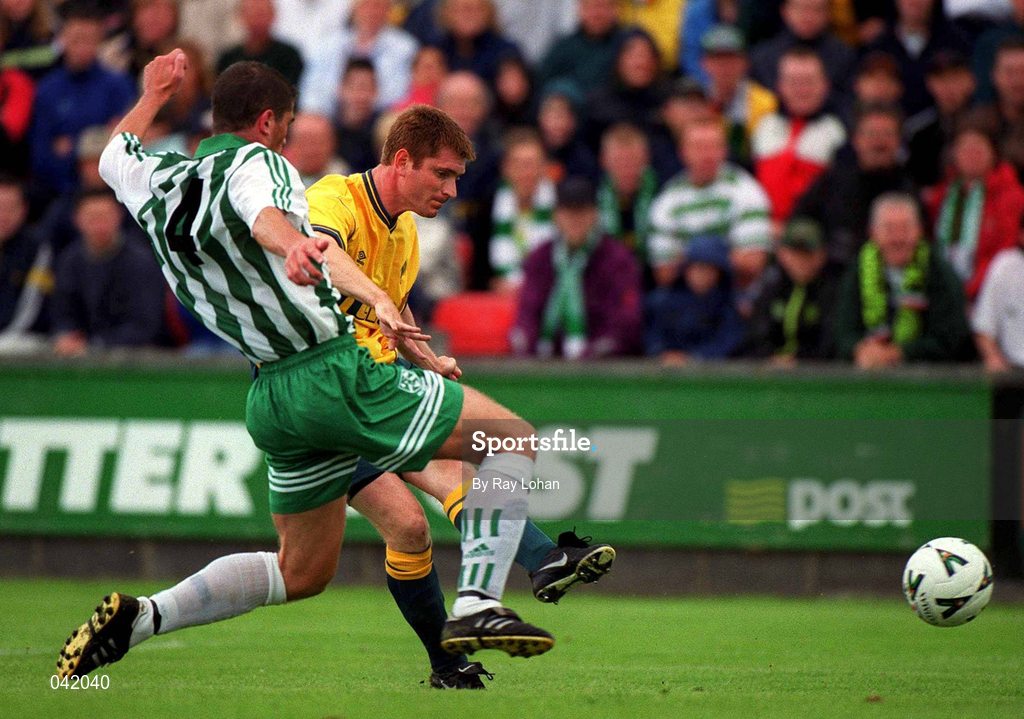 9 July 2000; Tommy Johnson of Celtic shoots to score his side's second goal under pressure from Jody Lynch of Bray Wanderers during the Pre-Season Friendly between Bray Wanderers and Celtic at the Carlisle Grounds in Bray, Wicklow. Photo by Ray Lohan/Sportsfile