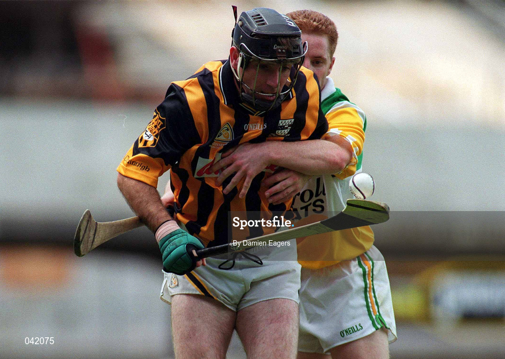 9 July 2000; DJ Carey of Kilkenny in action against Simon Whelan of Offaly during the Guinness Leinster Senior Hurling Championship Final match between Kilkenny and Offaly at Croke Park in Dublin. Photo by Damien Eagers/Sportsfile