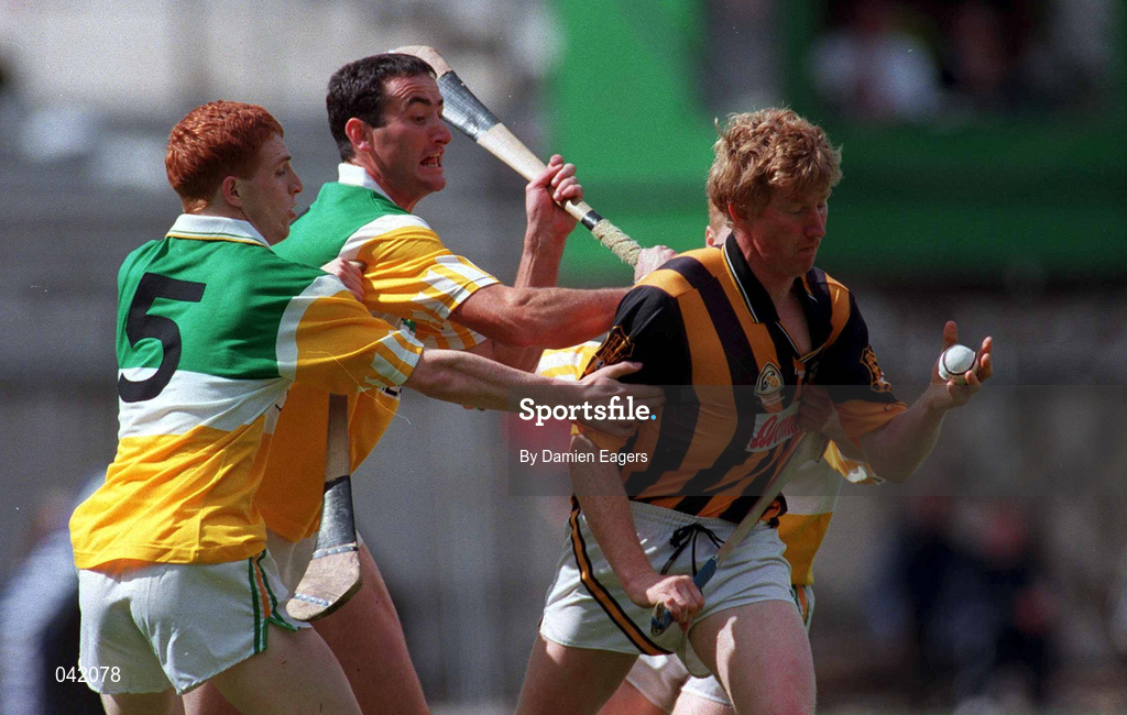 9 July 2000; John Power of Kilkenny in action against Offaly players, from left, Barry Whelahan, Kevin Kinahan and Simon Whelahan during the Guinness Leinster Senior Hurling Championship Final match between Kilkenny and Offaly at Croke Park in Dublin. Photo by Damien Eagers/Sportsfile