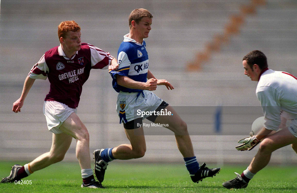 16 July 2000; Michael Brennan of Laois in action against Alan Lambden of Westmeath as Laois goalkeeper Michael Nolan gathers the ball during the Leinster Minor Football Championship Semi-Final Replay match between Westmeath and Laois at Croke Park in Dublin. Photo by Ray McManus/Sportsfile