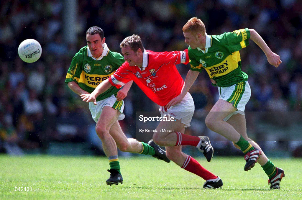 16 July 2000; James Masters of Cork in action against Seamus O'Sullivan of Kerry, right, during the Munster Minor Football Championship Final between Kerry and Cork at the Gaelic Grounds in Limerick. Photo By Brendan Moran/Sportsfile