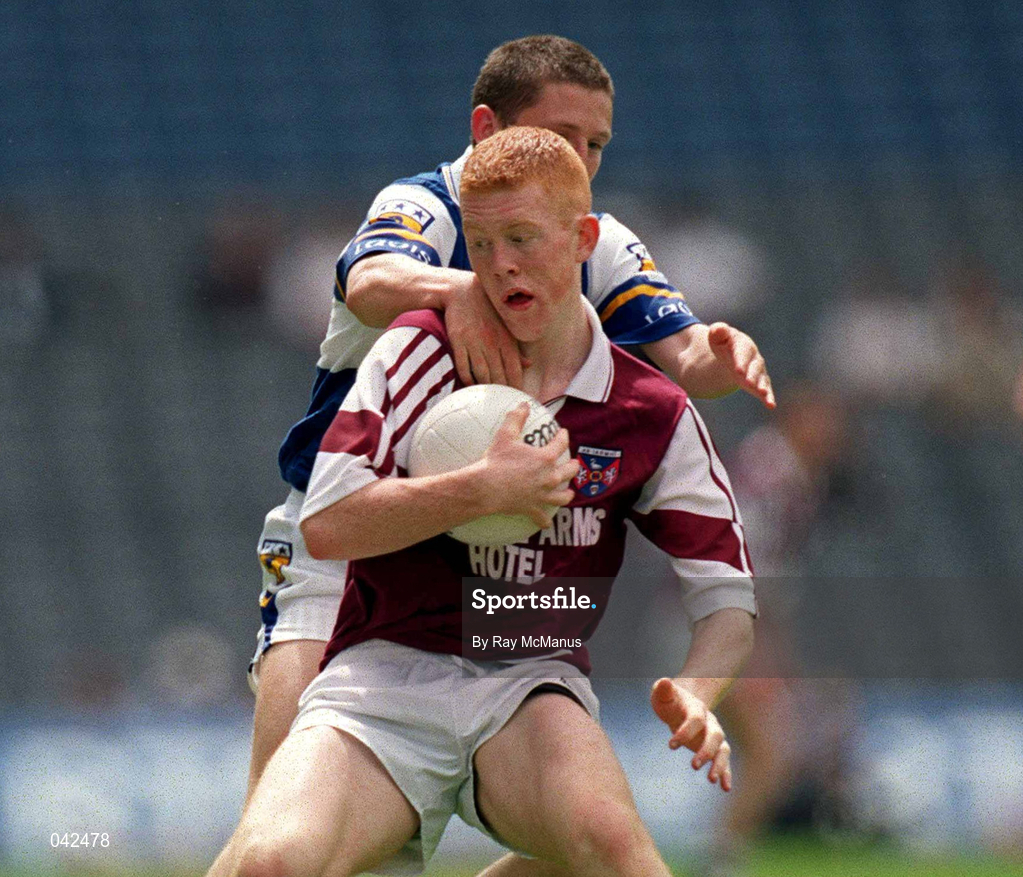 16 July 2000; Donal O'Donoghue of Westmeath in action against James Nolan of Laois during the Leinster Minor Football Championship Semi-Final Replay match between Westmeath and Laois at Croke Park in Dublin. Photo by Ray McManus/Sportsfile