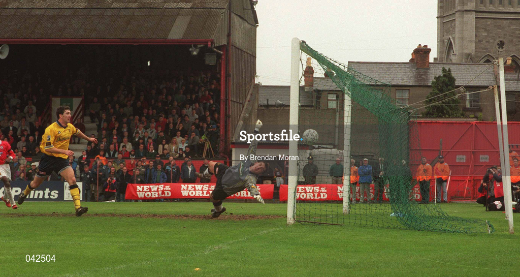 4 May 1997; Derry City goalkeeper Declan Devine fails to prevent Dave Campbell of Shelbourne from scoring his sides first goal during the FAI Cup Final match between Derry City and Shelbourne at Dalymount Park in Dublin. Photo by Brendan Moran/Sportsfile