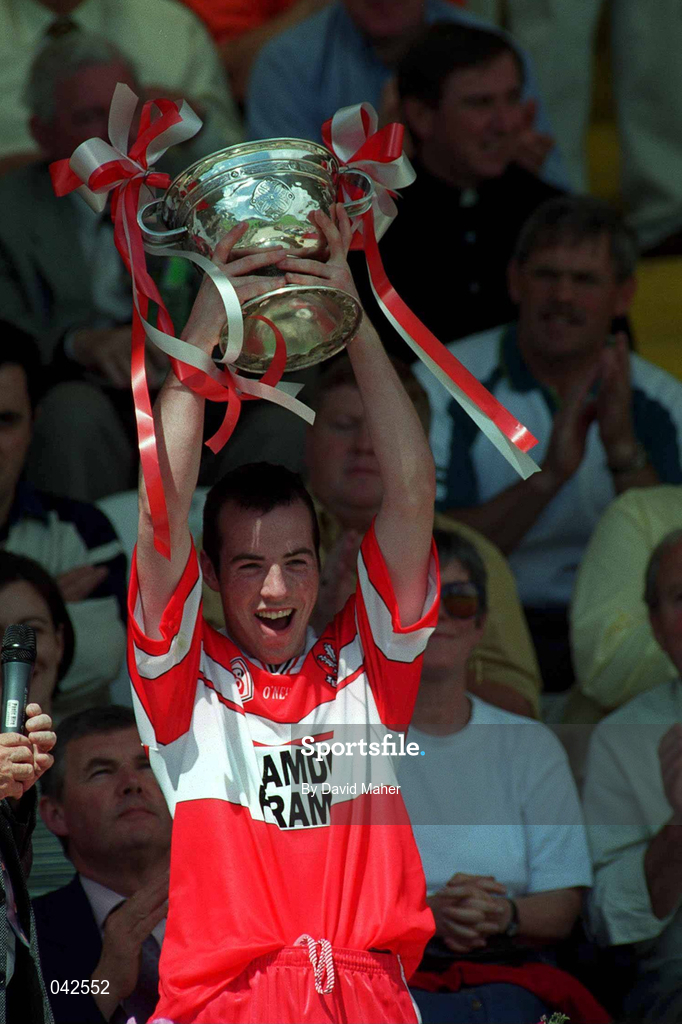 16 July 2000; Sean McKenna of Derry lifts the Fr Murray Cup following the Ulster Minor Football Championship Final match between Tyrone and Derry at St Tiernach's Park in Clones, Monaghan. Photo by David Maher/Sportsfile