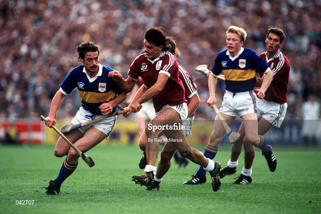 4 September 1988; Donie O'Connell of Tipperary in action against Gerry McInerney of Galway, also pictured are Aidan Ryan of Tipperary and Michael Coleman of Galway during the All-Ireland Senior Hurling Championship Final match between Galway and Tipperary at Croke Park in Dublin. Photo by Ray McManus/Sportsfile