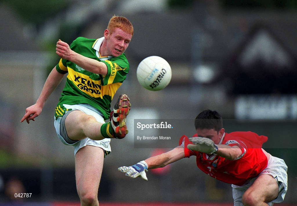 16 July 2000; Seamus Scanlon of Kerry in action against Kieran Murphy of Cork during the Munster Minor Football Championship Final between Kerry and Cork at the Gaelic Grounds in Limerick. Photo By Brendan Moran/Sportsfile