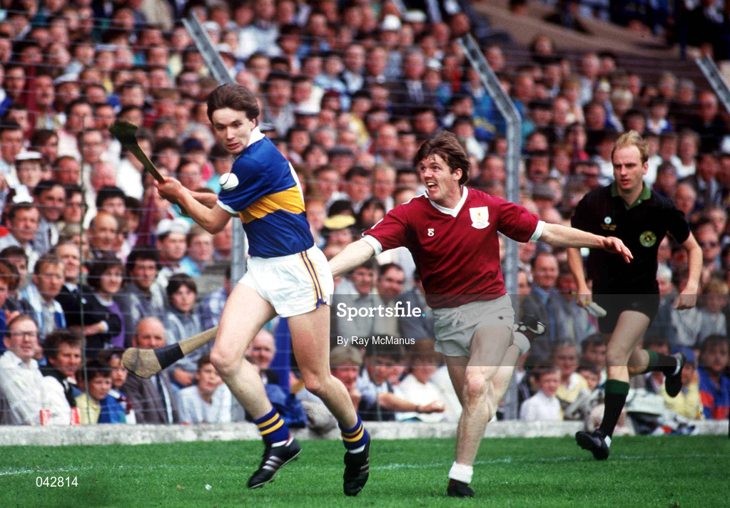 9 August 1987; John Kennedy of Tipperary in action against Martin Naughton of Galway during the All-Ireland Senior Hurling Championship Semi-Final match between Tipperary and Galway at Croke Park in Dublin. Photo by Ray McManus/Sportsfile