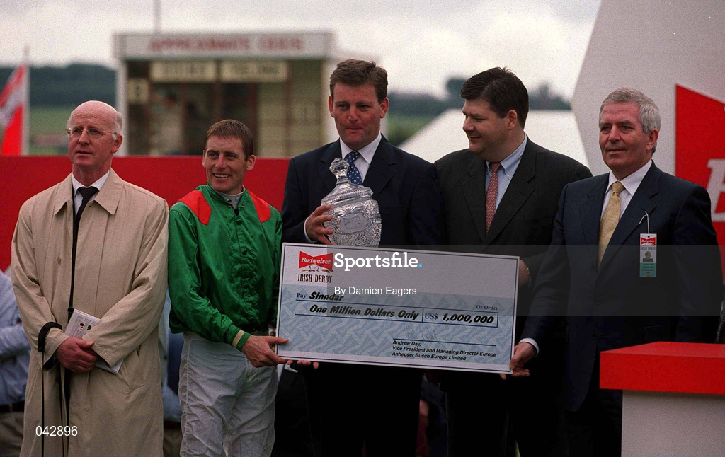 2 July 2000; Jockey Johnny Murtagh, who won The Budweiser Irish Derby on Sinndar with winning trainer John Oxx, are presented with a cheque at The Curragh Racecourse in Newbridge, Kildare. Photo by Damien Eagers/Sportsfile