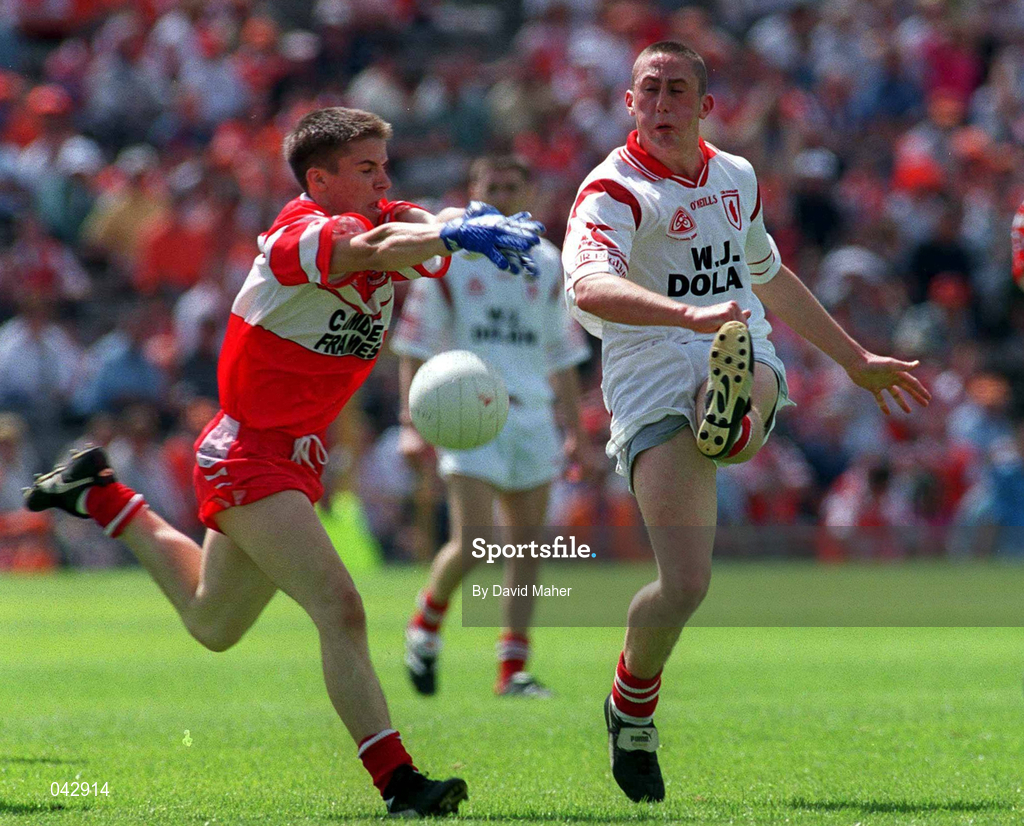 16 July 2000; Shane Mallon of Tyrone in action against Martin O'Kane of Derry during the Ulster Minor Football Championship Final match between Tyrone and Derry at St Tiernach's Park in Clones, Monaghan. Photo by David Maher/Sportsfile