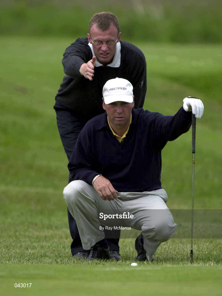 6 June 2000; Garth McGimpsey, together with his caddy Ronan T Lang, line up a putt on the 2nd during the Final Round of the East of Ireland Championship at the County Louth Golf Club in Baltray, Louth. Photo by Ray McManus/Sportsfile