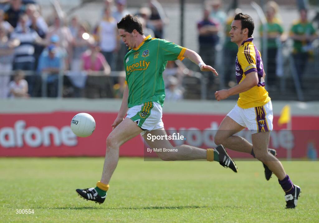 1 June 2008; Peadar Byrne, Meath, in action against Adrian Morrissey, Wexford. GAA Football Leinster Senior Championship Quarter-Final, Meath v Wexford, Dr. Cullen Park, Carlow. Picture credit: Matt Browne / SPORTSFILE
