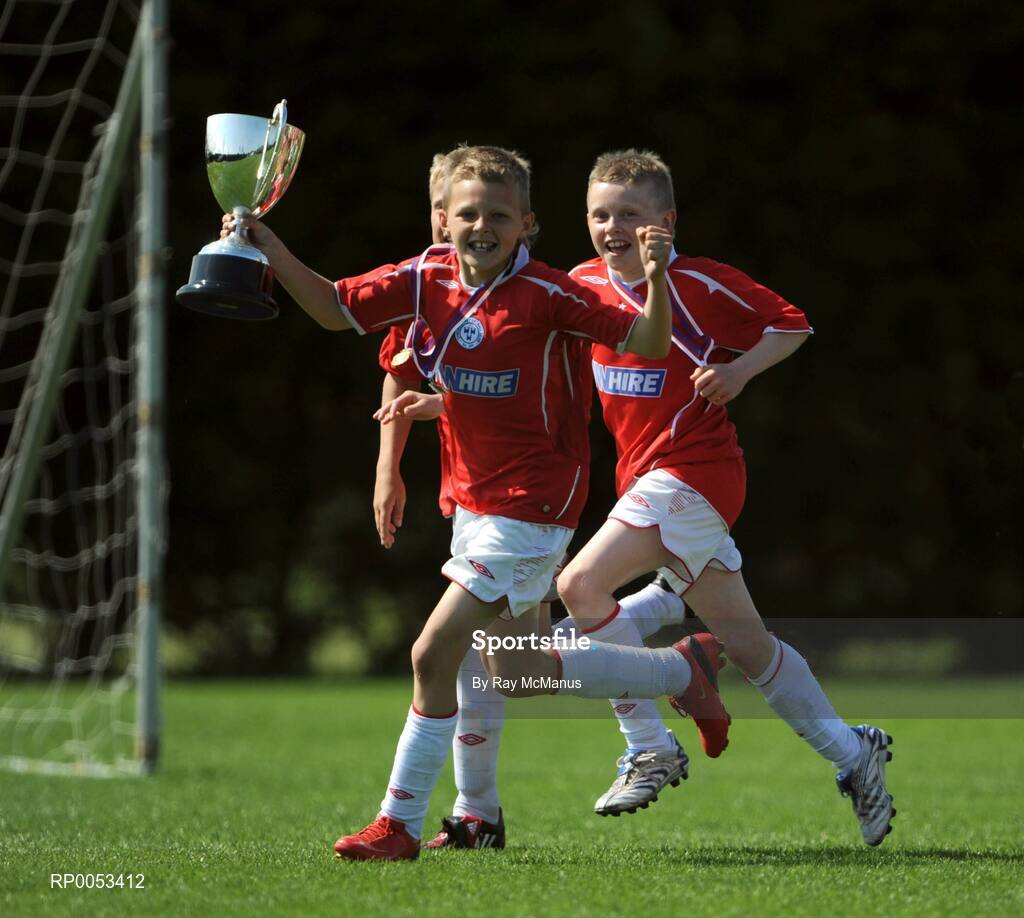7 June 2008; The Shelbourne captain Aaron Ashe celebrates with team-mates Luke Duff and Lee Delaney after they won the Danone Nations Cup National Final. AUL Complex, Clonshaugh, Dublin. Picture credit: Ray McManus / SPORTSFILE
