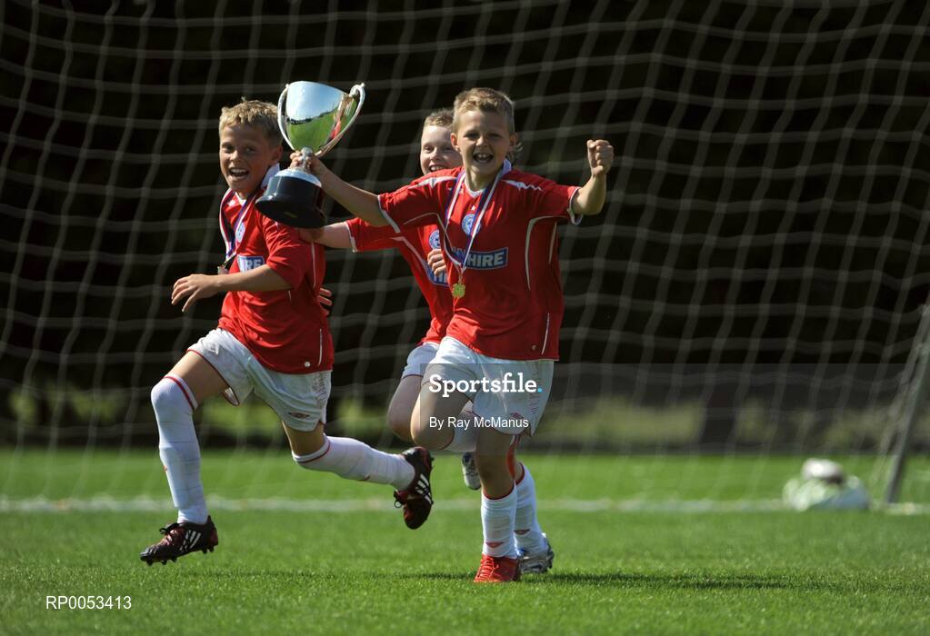7 June 2008; The Shelbourne captain Aaron Ashe celebrates with team-mates Luke Duff and Lee Delaney after they won the Danone Nations Cup National Final. AUL Complex, Clonshaugh, Dublin. Picture credit: Ray McManus / SPORTSFILE