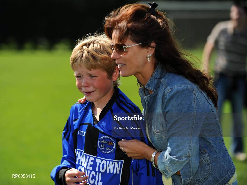 7 June 2008; Chris Reid, Willow Park FC, Athlone, Co. Westmeath, is comforted by his mother Anne after his side was beaten in the Danone Nations Cup National Final. Shelbourne FC, Dublin, v Willow Park, Athlone, Co. Westmeath. AUL Complex, Clonshaugh, Dublin. Picture credit: Ray McManus / SPORTSFILE