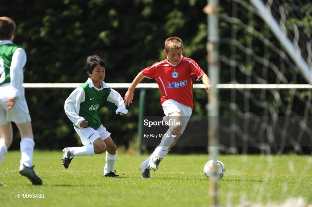 7 June 2008; Regan Donelon, Shelbourne, in action against Nathan Fennelly, Abbeylix AFC, during the Danone Nations Cup National Finals, AUL Complex, Clonshaugh, Dublin. Picture credit: Ray McManus / SPORTSFILE