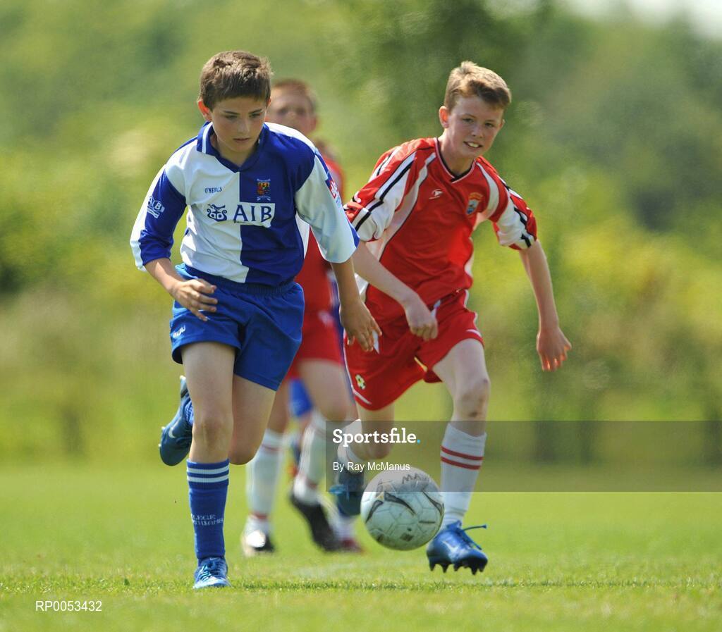 7 June 2008; Shane Daly, College Corinthians AFC, in action against Conor Tierney, New Ross, during the Danone Nations Cup National Finals, AUL Complex, Clonshaugh, Dublin. Picture credit: Ray McManus / SPORTSFILE  *** Local Caption *** send to Cork papers, Irish Examiner, and Wexford papers