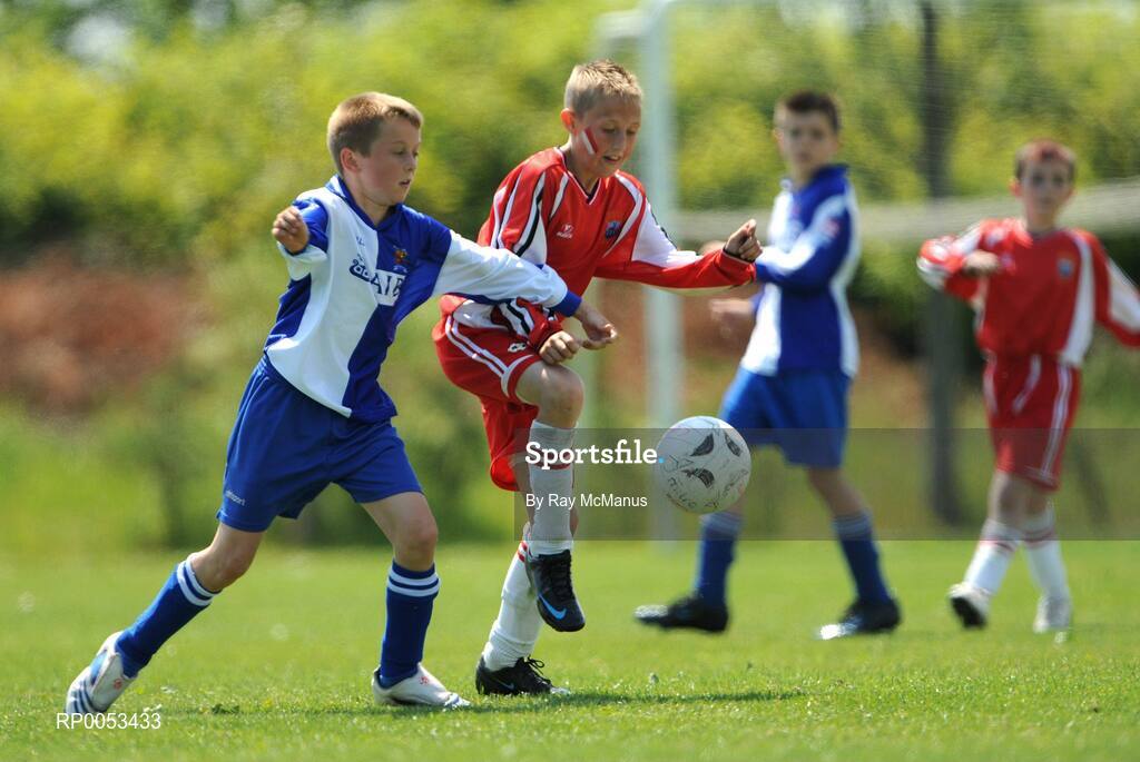 7 June 2008; Ben McAuliffe, College Corinthians AFC, left, in action against Eoin Rhodes, New Ross Celtic, during the Danone Nations Cup National Finals, AUL Complex, Clonshaugh, Dublin. Picture credit: Ray McManus / SPORTSFILE  *** Local Caption *** send to Cork papers, Irish Examiner and Wexford papers