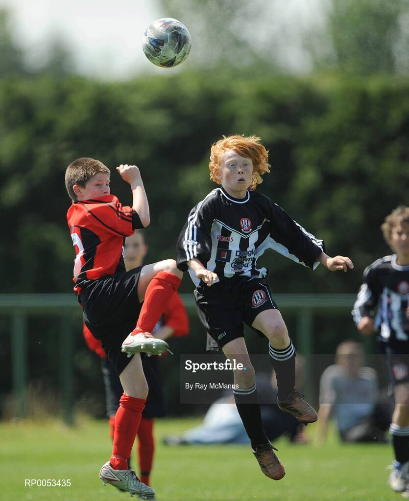 7 June 2008; Kenny Dolan, Willow Park F.C. in action against Andrew Ramsey, St Josephs Boys,  during the Danone Nations Cup National Finals, AUL Complex, Clonshaugh, Dublin. Picture credit: Ray McManus / SPORTSFILE  *** Local Caption *** send to Westmeath papers and Dublin papers