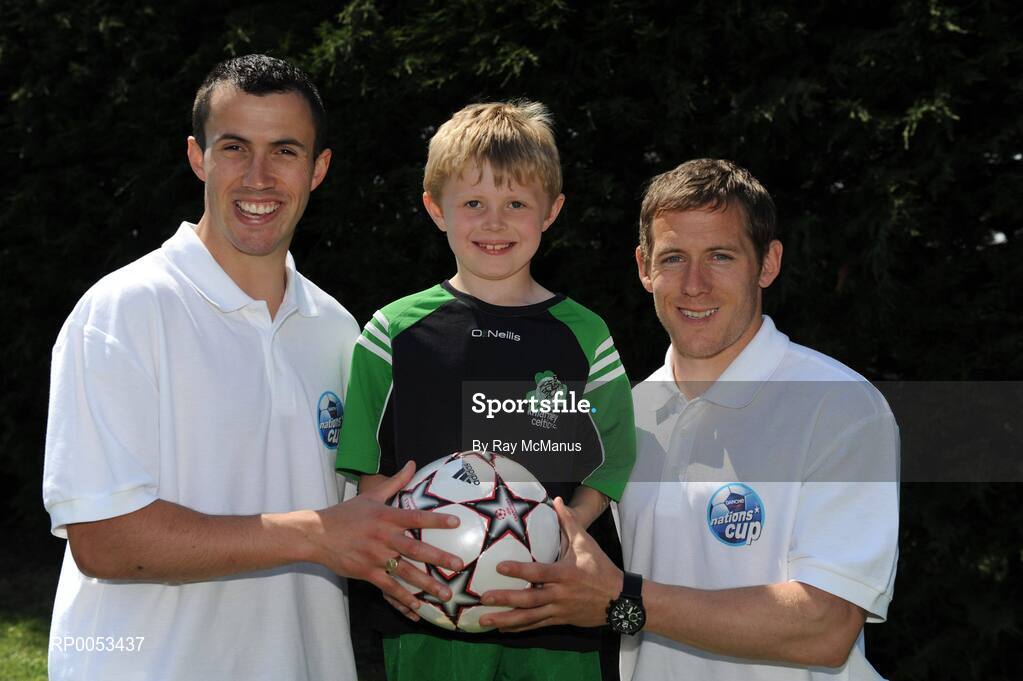 7 June 2008; Seven-year-old Darragh Lyne from Killarney, Co Kerry, with eircom league players Keith Fahey, left, St Patrick's Athletic, and Joe Gamble, Cork City, at the Danone Nations Cup National Finals. Darragh was a finalist in the supporters competition. AUL Complex, Clonshaugh, Dublin. Picture credit: Ray McManus / SPORTSFILE  *** Local Caption *** to Kerry papers
