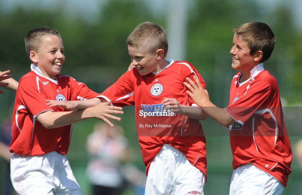 7 June 2008; Lee Delaney, centre, celebrates scoring the third goal for Shelbourne FC with his team-mates Jason Caffrey, left, and Regan Donelon during the Danone Nations Cup National Final. Shelbourne FC, Dublin, v Willow Park, Athlone, Co. Westmeath. AUL Complex, Clonshaugh, Dublin. Picture credit: Ray McManus / SPORTSFILE